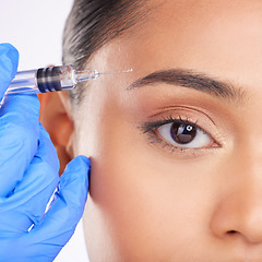 Image showing Eyebrow, woman and portrait of injection, plastic surgery and facial beauty process on white background in studio. Closeup, facelift and needle at eyes for aesthetic filler, skincare or prp cosmetics