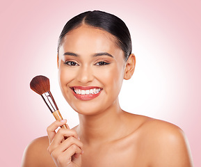 Image showing Woman, makeup and portrait of brush in studio for beauty, skincare and aesthetic of face on pink background. Happy model, dermatology and cosmetics tools for foundation, facial powder and makeover