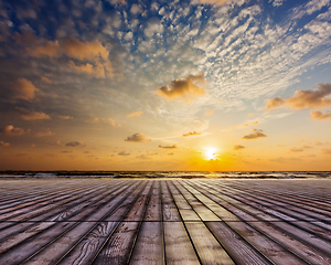 Image showing Wooden surface under sunset sky