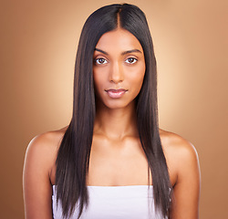Image showing Portrait, hair care and woman with beauty, skincare and dermatology on a brown studio background. Face, person or model with aesthetic, luxury and glow with healthy skin, texture or volume with shine