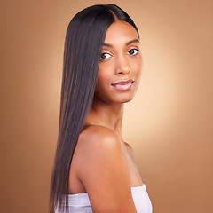 Image showing Beauty, hair and skincare with portrait of woman in studio for keratin, salon treatment and texture. Shampoo, health and growth with face of model on brown background for glamour, shine and hairstyle