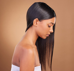 Image showing Beauty, hair and skincare with profile of woman in studio for keratin, salon treatment and texture. Shampoo, health and growth with face of model on brown background for glamour, shine and hairstyle