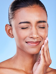 Image showing Toothache, sad and a woman with mouth pain on a blue background with a dental emergency. Dentist, frustrated and a girl with a problem with a teeth injury, gingivitis or inflammation of a gum