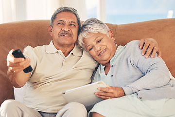 Image showing Tablet, TV and senior couple streaming movie or show with love, care and bonding in home living room together. App, remote and elderly people relax and watching a subscription service in retirement