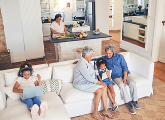 Image showing Big family, above and with technology in the living room with grandparents for cartoon or gaming. Happy, love and children on the sofa with a senior man and woman and a laptop or tablet for streaming