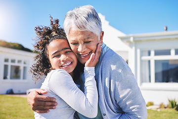 Image showing Hug, home and grandmother with child in a garden and travel together on outdoor holiday for happiness. Vacation, smile and elderly grandparent with girl kid or grandchild for love, care and support