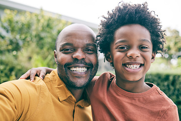 Image showing Portrait, father and child take a selfie in nature as a happy family to relax on holiday together. Smile, faces or African dad taking picture or photograph with an excited young boy or kid in park