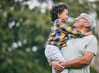 Image showing Hug, love or grandpa with child in nature for bonding, travel or adventure together in retirement. Eye contact, smile or kid with grandfather in park, forest or woods on holiday vacation with care