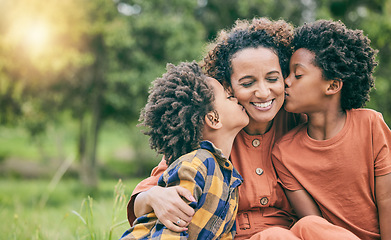 Image showing Happy, kiss and mother with children in park for relax, bonding and love mockup. Care, support and smile with woman and kids in grass field in nature for black family, summer and happiness together