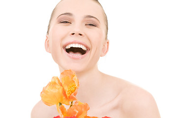 Image showing laughing woman with flowers