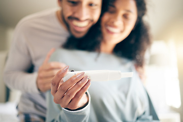 Image showing Pregnancy test, hands of woman and happy couple, smile and baby announcement together in home. Pregnant, person and new mother, fertility and support for positive results and ivf success or news