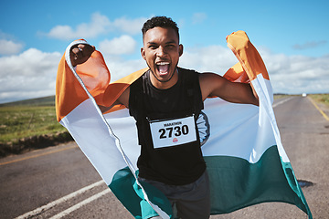 Image showing Celebration, portrait and man with flag of India or runner on a road in nature for success in race, competition or marathon. Sports, winner and athlete cheering for cardio, running or achievement