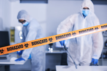 Image showing Hazard, tape and people in danger working with toxic, biology or team disinfect dangerous bacteria or health emergency. Biohazard, protection and medical staff in hazmat suit cleaning for bio safety