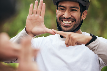 Image showing Cycling, sign language and a man in training outdoor for fitness or communication with a deaf friend. Team building, health and a cyclist talking to a sports person with a disability in nature