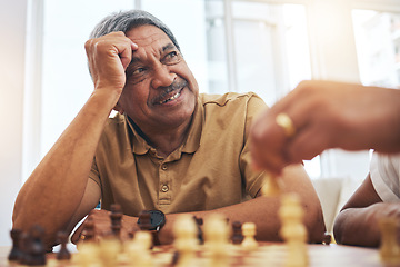 Image showing Senior man, home and chess for competition, game and strategy with friend for focus and relax in living room. Thinking, elderly and person with board for challenge, planning and mindset in house