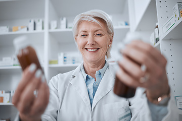 Image showing Happy senior woman, pharmacist and medicine for inventory inspection or checking stock on shelf at store. Mature female person, medical or healthcare worker reading pharmaceutical product at pharmacy