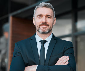 Image showing Business man, mature and portrait outdoor with arms crossed for professional career and positive attitude. Face of entrepreneur or CEO person with pride, confidence and ambition of corporate boss