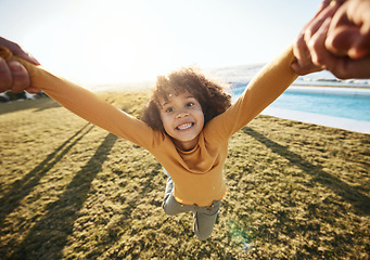 Image showing Swing, pov portrait of girl and hands of parent in garden, spinning and circle movement kid on grass of home for play, love and happiness. Smile, relax and person flying for game and freedom