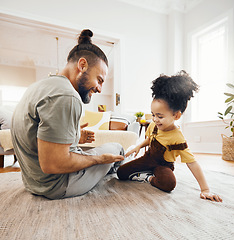 Image showing Happy family, father and child with hand game on floor of living room for learning, love and development. Smile, person and kid on ground in lounge of apartment for relax, happiness and care