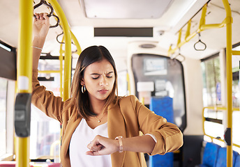 Image showing Woman on a bus, transport and check time on commute, travel to work or university with city and traffic. Transportation, vehicle and student late, journey and schedule with metro and public service