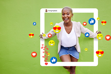 Image showing Black woman, portrait and social media emojis, like and heart icons isolated on green background or mockup wall space. Smile, influencer and content creator with photography frame, graphic or overlay