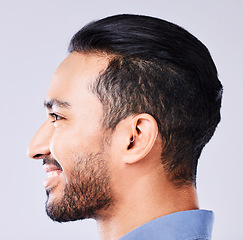 Image showing Man, hearing aid and studio profile for ear, wellness and smile for solution by white background. Happy patient, audio tech and hearing for person with disability with smile, sound implant and health