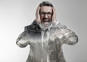 Image showing Business man, nature double exposure and stress with scream, worry and anxiety for deforestation in studio. Entrepreneur, fear and scared of climate change with forest, trees or sustainability at job