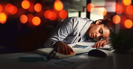 Image showing Business woman, sleep and office in night, tired and bokeh with burnout, stress or deadline for financial report. Accountant, audit and fatigue at desk for proposal, project or rest in dark workplace