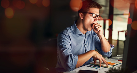 Image showing Business man, yawn and tired in night, desk or bokeh with burnout, stress and deadline in modern office. Accountant, audit and fatigue with documents, notebook or chart for analysis in dark workplace