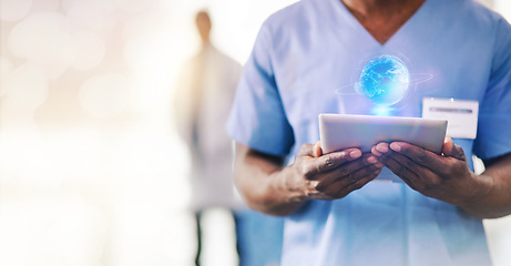 Image showing Hands, doctor and tablet with globe hologram, healthcare and person with tech innovation for digital transformation. Medical research, overlay and mockup space, hospital and global futuristic health