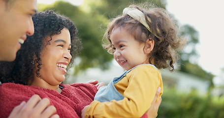 Image showing Family, parents and baby outdoor, play and happiness with love, bonding and quality time together. Mother, father and daughter in a park, fun and laughing with joy, support and relax with freedom