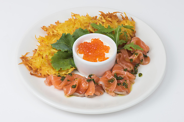 Image showing potato pancakes salmon fish and red caviar