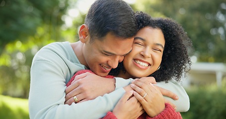 Image showing Love, smile and a married couple hugging in the garden of their home together for romance during summer. Spring, dating and smile with happy young people in the backyard while bonding in spring