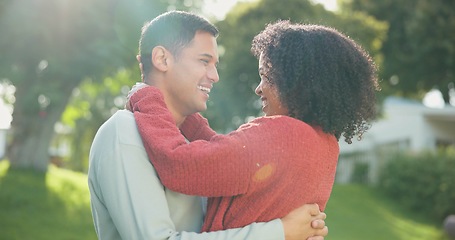 Image showing Hug, backyard and couple with love, peace and bonding with quality time, romantic and happiness. Romance, man and woman outdoor, park and loving together in a park, embrace and support with care