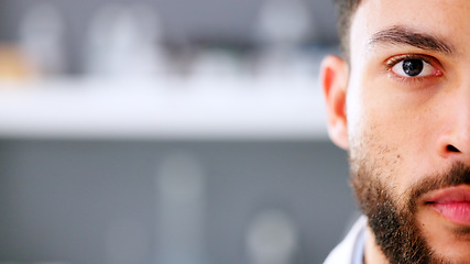 Image showing Face of serious young male in a high stress environment. Closeup of a business man head with a beard feeling anxious and stressed about work. Nervous office employee worried and looking forward.