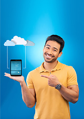 Image showing Cloud computing, happy man and phone for networking, computer system and information technology with smile in studio. Smartphone, person and global internet for big data and digital transformation