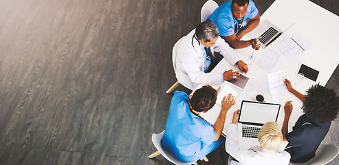 Image showing Hospital, meeting and doctors with nurses, laptop or tablet from above for surgery, advice or planning. Healthcare, teamwork or people in office for help, collaboration or results, review or analysis