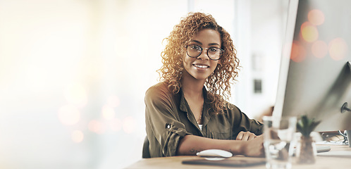 Image showing Smile, desk and portrait of a woman in an office for business, corporate work or planning. Happy, morning and a young employee at a table or workspace for a schedule, email typing or connection on pc
