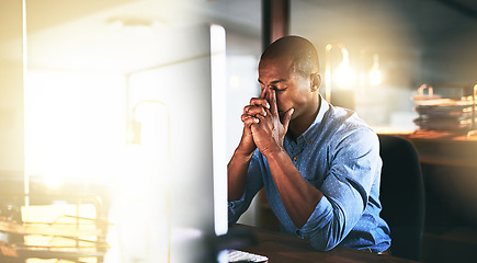 Image showing Burnout, headache or tired black man in office with fatigue, problem or stress working overtime at night. Depression, computer or exhausted software developer frustrated by eye strain or migraine