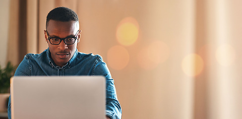 Image showing Laptop, bokeh and black man typing in office with mockup space and business communication on email. Networking, research or businessman checking website for an update or article online in workplace