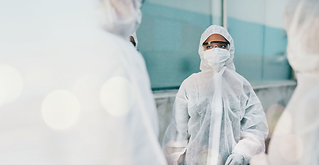 Image showing PPE, quarantine and safety suit of lab worker and healthcare professional in a hospital or clinic. Cleaning, bacteria protection and face mask with virus, pharmacy and wellness research with bokeh