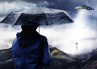 Image showing Rain umbrella, man and ufo of alien outdoor on spaceship in science fiction mystery on countryside adventure. Flying saucer, back and person with extraterrestrial object for night abduction in storm