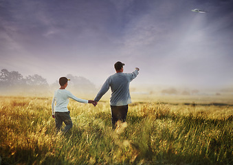 Image showing Back, alien and flying spaceship with a family outdoor in nature together during invasion or ufo discovery. Universe, earth and people in the countryside to search for proof of extraterrestrial life