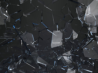 Image showing Pieces of glass broken or cracked on black