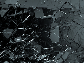 Image showing Pieces of glass broken or cracked on black