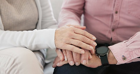 Image showing Closeup of senior couple holding hands for love, care and trust in retirement. Old man, woman and helping hand for loyalty to partner in kindness, hope and support to forgive, with empathy at home