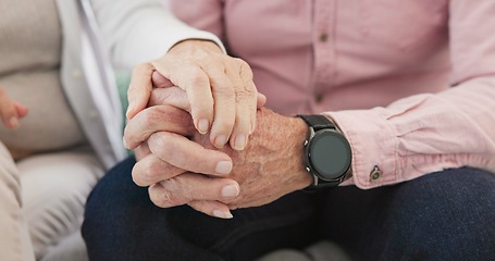 Image showing Closeup of old couple, man and woman holding hands for love, care and trust in retirement. Senior partner, loyalty and helping hand for kindness, sorry and support to forgive, hope or empathy at home