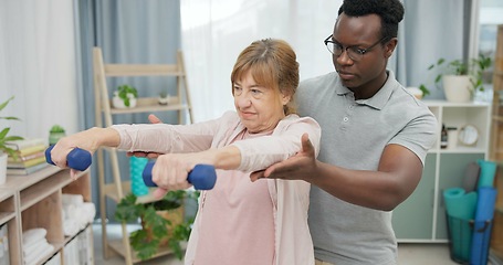 Image showing Physiotherapy, arms and senior woman with black man and dumbbell for body assessment. Physical therapy, weightlifting and elderly female with therapist for recovery, training and healing exercise