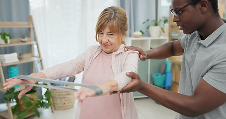 Image showing Physiotherapy, arms resistance band and old woman for rehabilitation, recovery or help for motion training. Physical therapy, black man or physiotherapist stretching senior woman for mobility problem