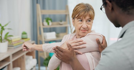 Image showing Physiotherapy consultation, stretching arm and old woman for rehabilitation, recovery or advice on injury healing. Physical therapy, black man and elderly patient listening to African physiotherapist